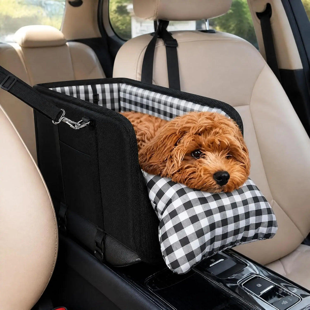 Small dog resting its chin on the plush pillow of the Safety Pet Seat on a car center console